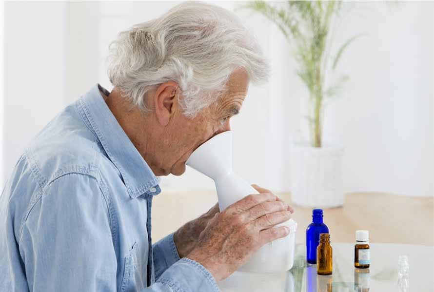 older-man-inhalation-with-essential-oils