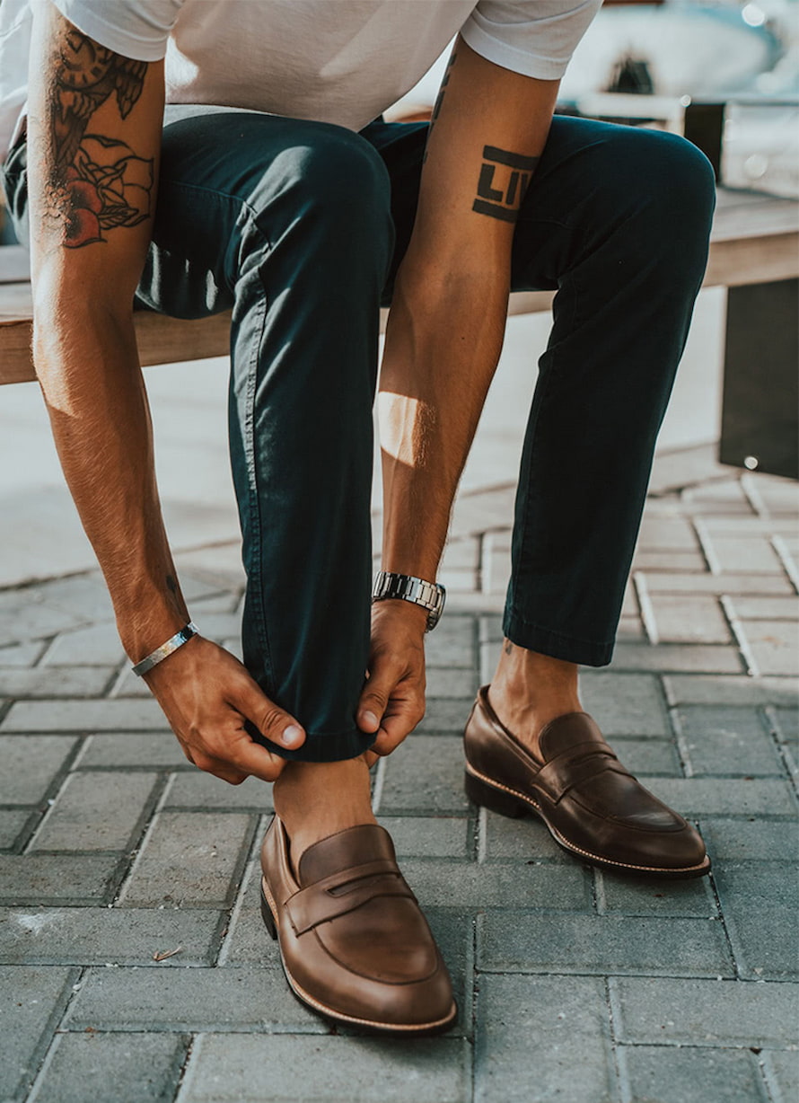 men with tattoes and loafers