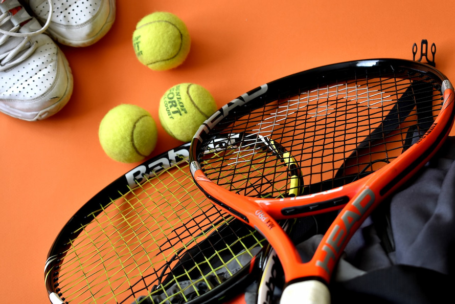 Tennis racket, trainers, balls