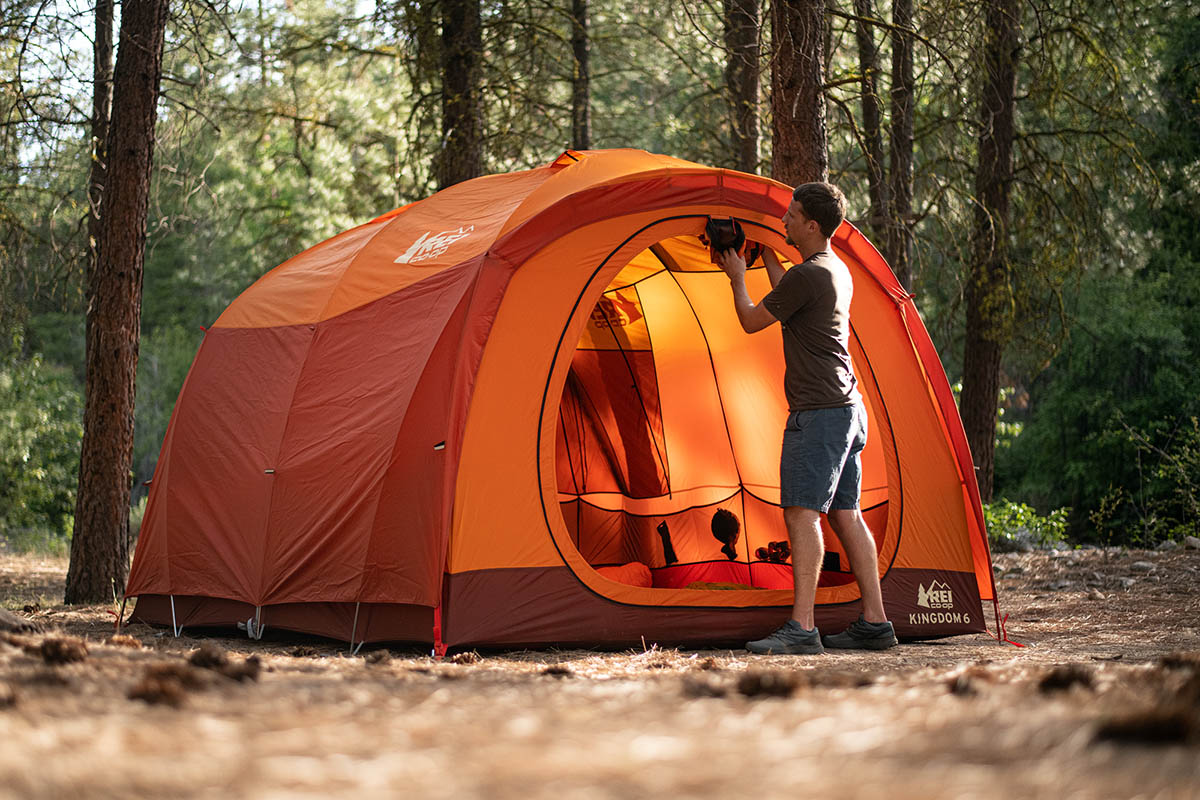 When shopping for tents, you'll discover that sizing varies per individual. A one-person tent offers enough space for one person to lie flat in a sleeping bag, but there won't be much extra room for stuff. If you're petite, you might be able to fit your backpack inside the tent with you. Two-person tents can accommodate two people side by side, but only if you don't mind sleeping directly against each other. They're ideal for couples, but if you want a little extra space, three-person tents are appropriate for two people; however, some companies manufacture 2.5-person tents, which are ideal for couples, or people with small children or pets who need more room.
