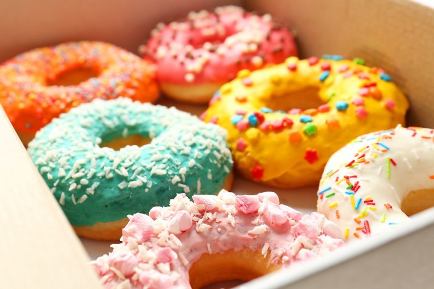 colourful donuts in a box  close up