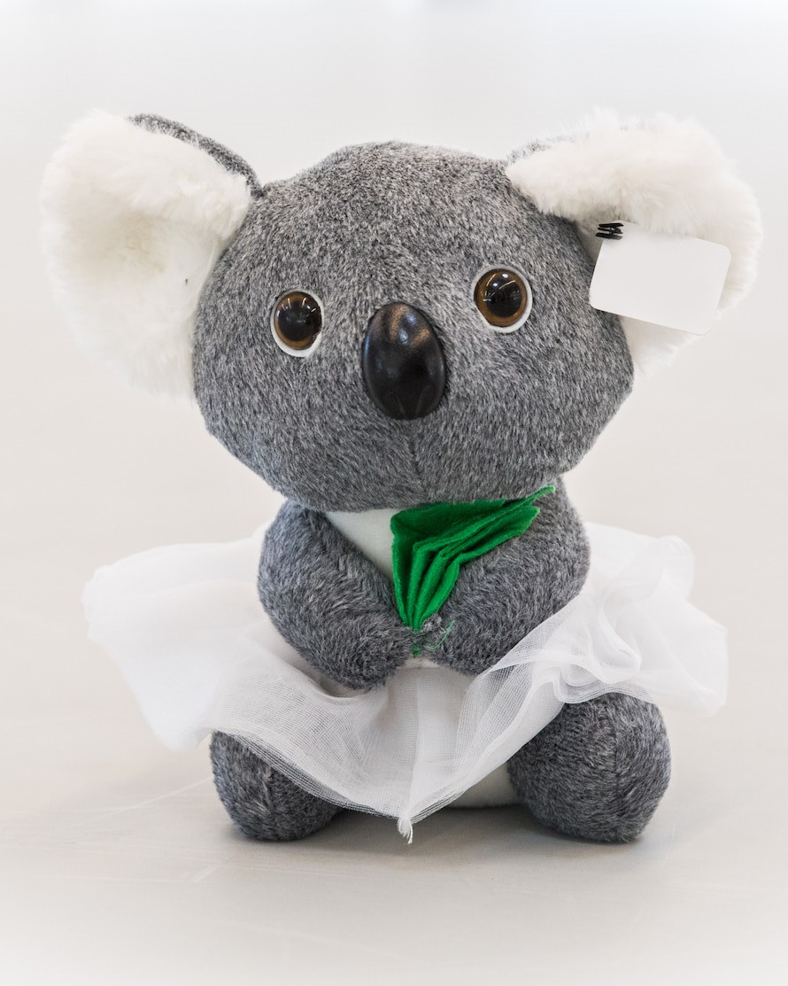 soft koala toy wearing tutu