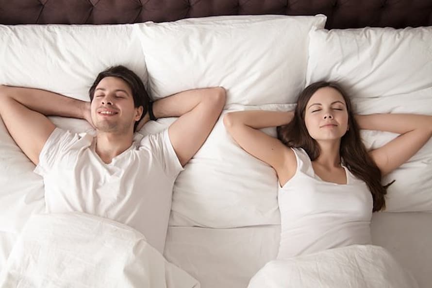 couple on queen size bed