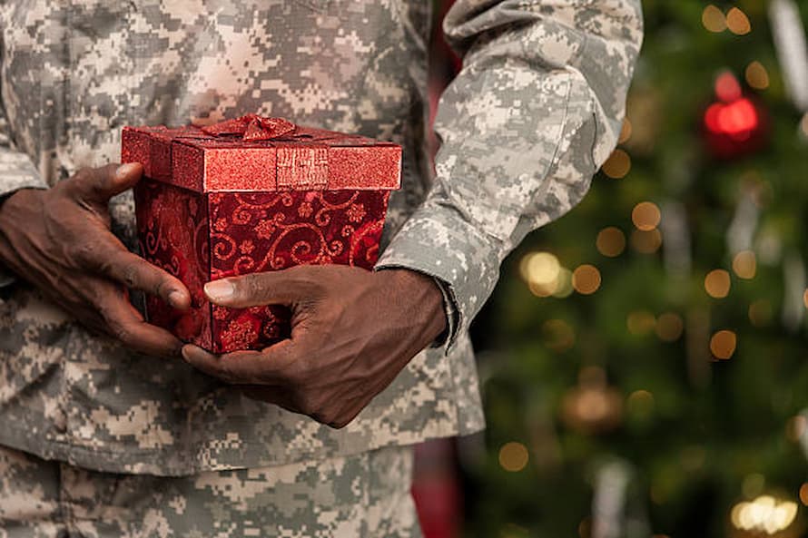 Soldier with Christmas Gift