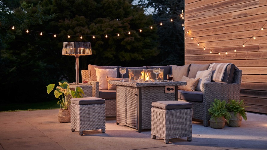 cozy patio with candles and lights