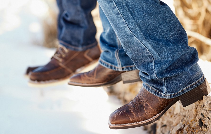 men wearing classic jeans and Ariat boots