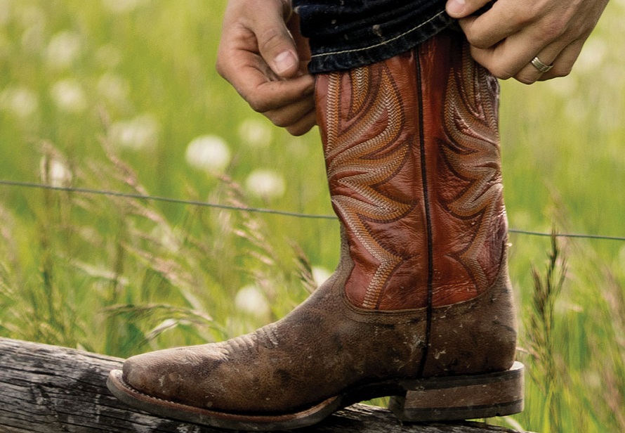 man checking on a Ariat men boots