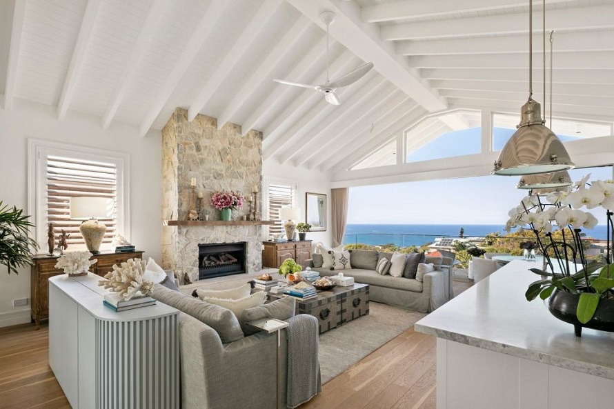 home in hamptons style interior design with a sea view