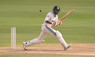 cricket player wearing cricket helmet