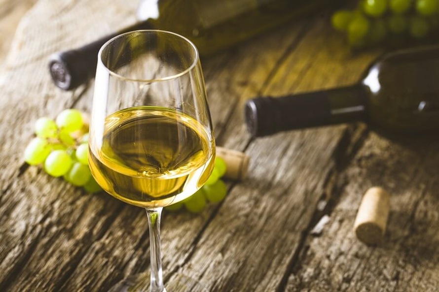 a full glass of chardonnay wine