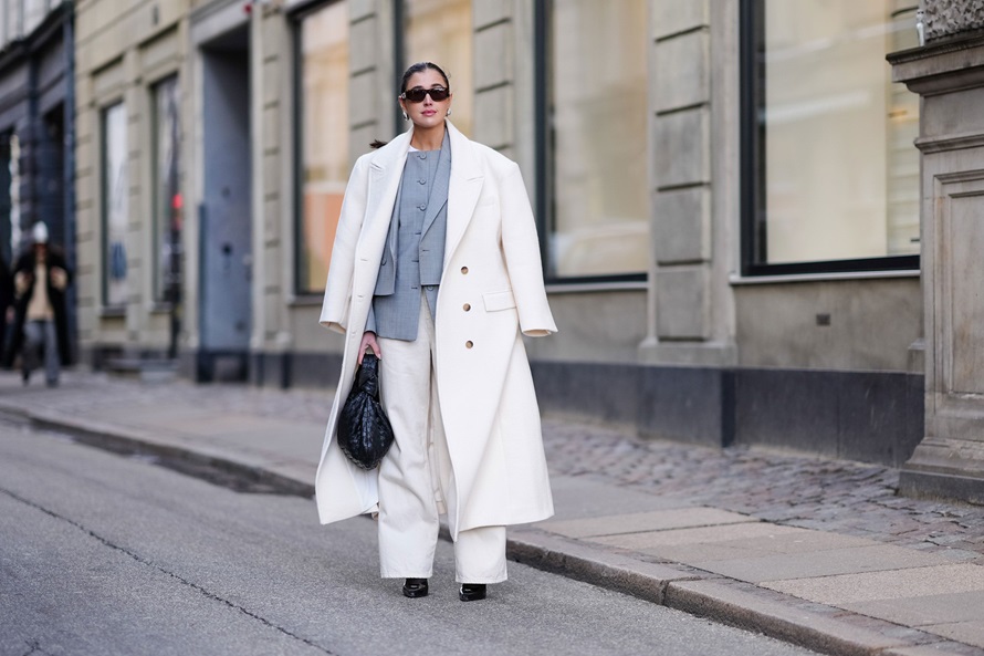 a stylish woman wearing contemporary office attire