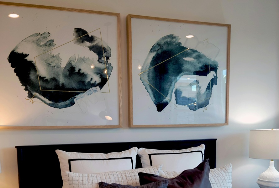 two abstract prints in the living room