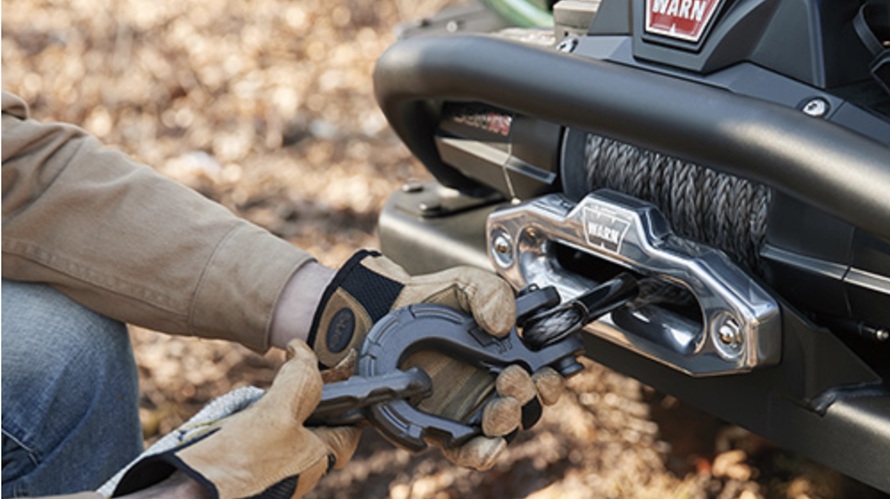 man putting on a winch