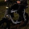 man driving an electric scooter from Cruzr